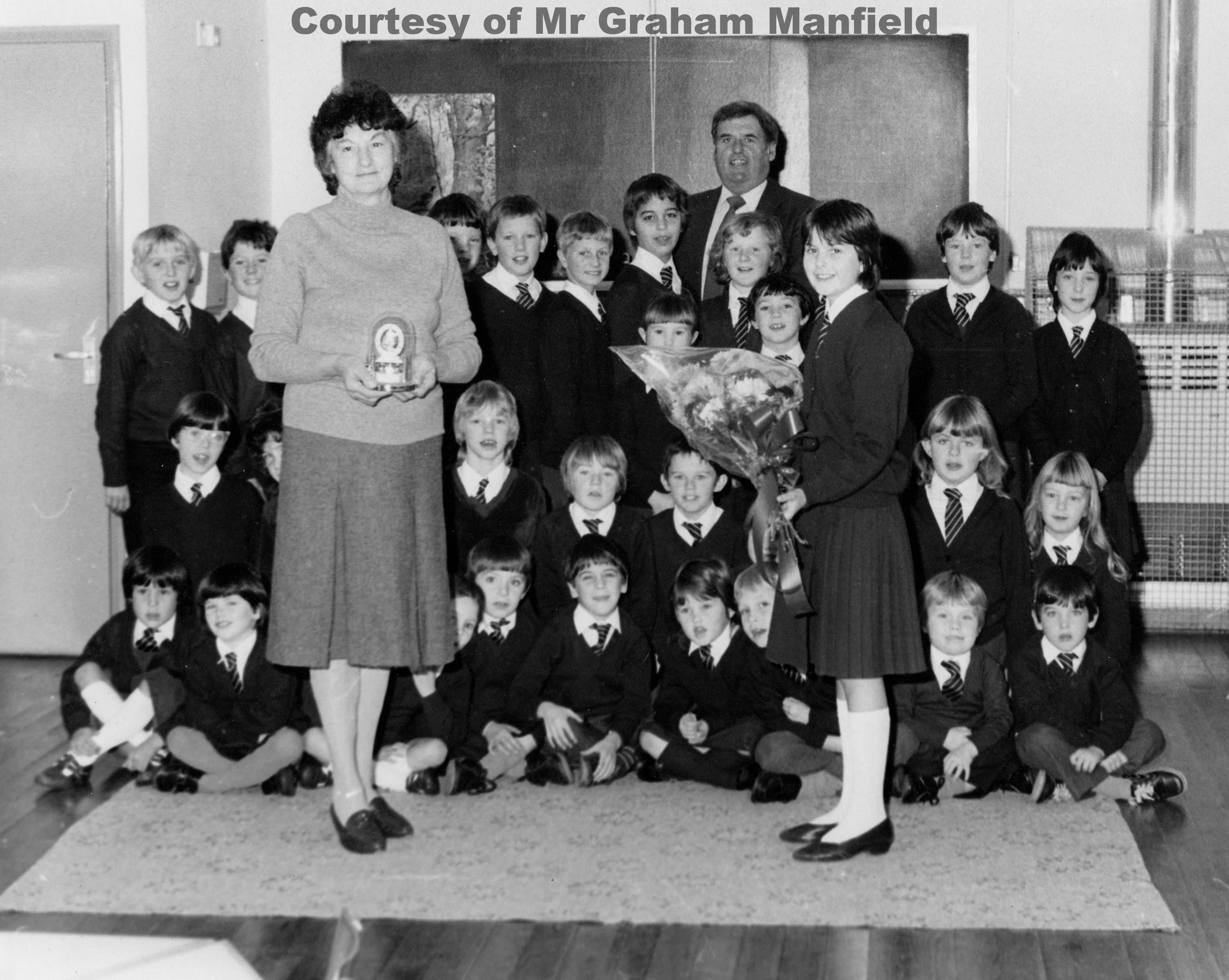 Mrs Margaret Manfield Caretaker at Goonhavern School retires in Nov 1983 after 14 years.