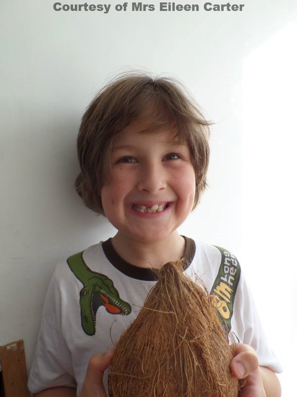 A delighter young Perran wins a Coconut at Goonhavern Fete 60th Anniversary on 16th Aug 2014.