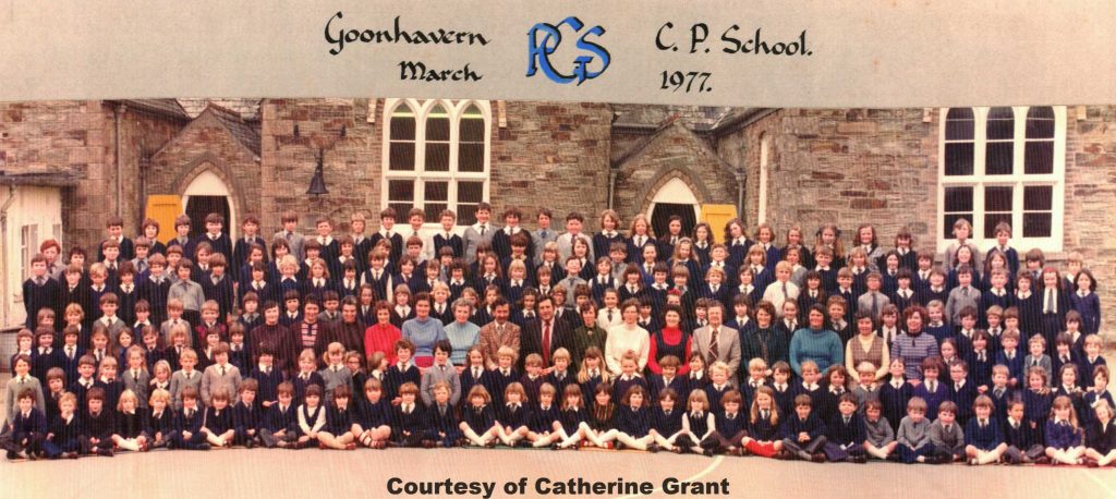 This photo was apparently taken in celebration of the School's 100th Centenary, showing Mr Tom Delbridge Headmaster, his Staff and pupils.